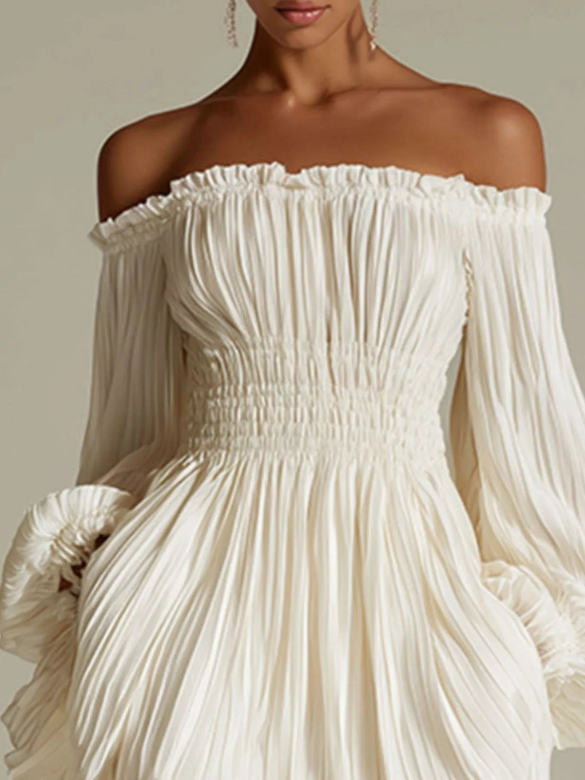 Off-shoulder pleated mini dress