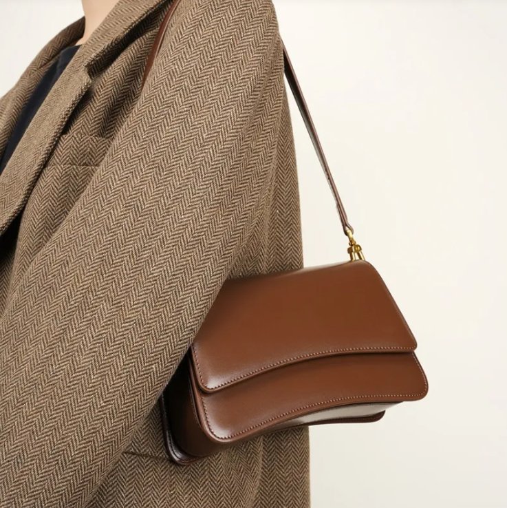 Glossed leather shoulder bag