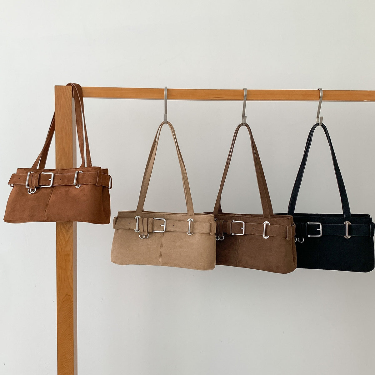 Belted baguette shoulder bag