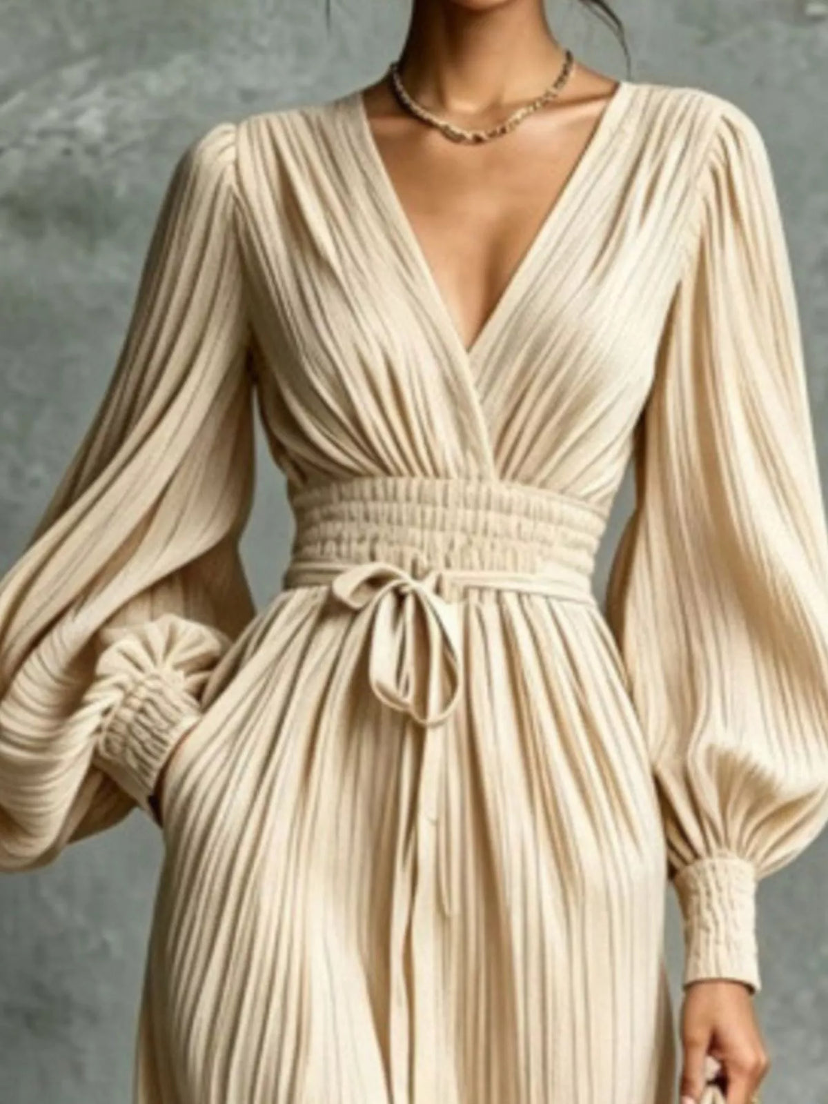 Elegant pleated V-neck maxi dress with lantern sleeves and tie-waist