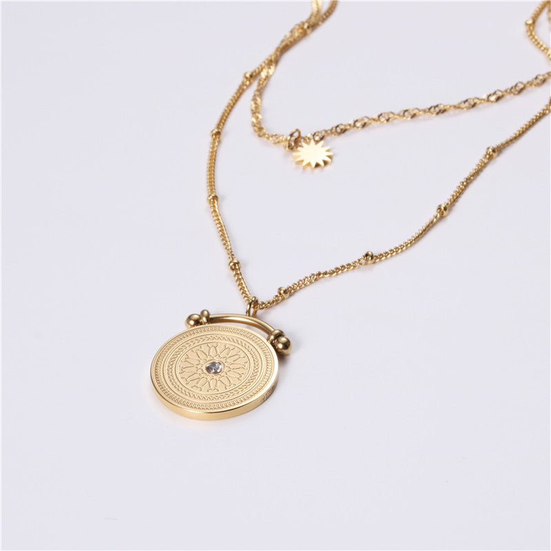 Gold coin layered necklace