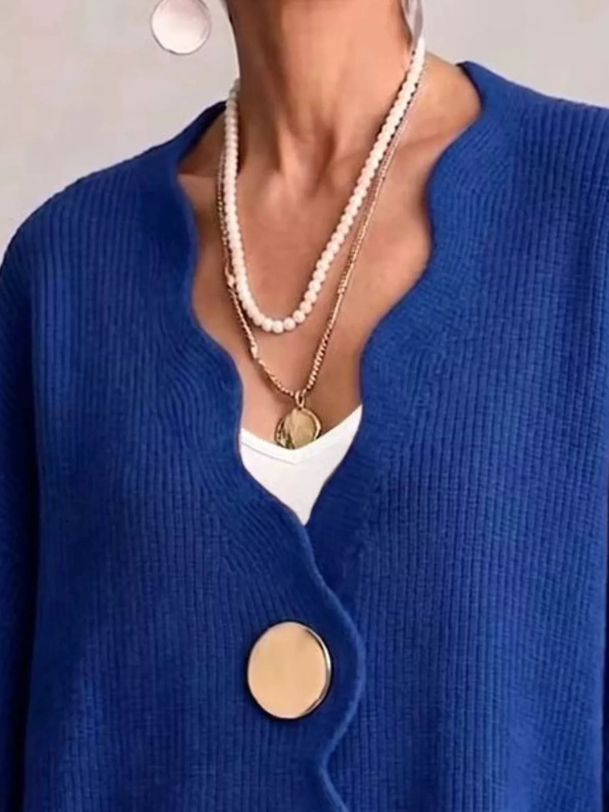 Scalloped-edge oversized button-down cardigan