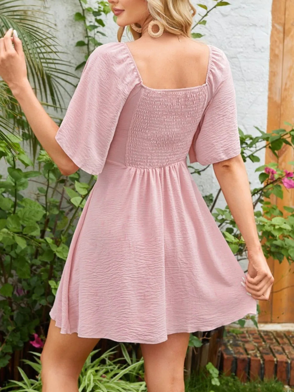 Flutter-sleeve tie dress