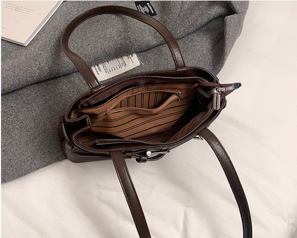 Belted baguette shoulder bag