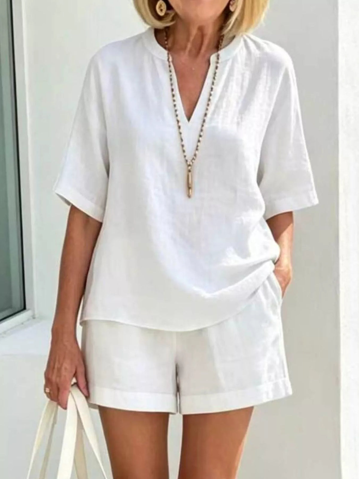 Half-sleeve top and shorts set – white