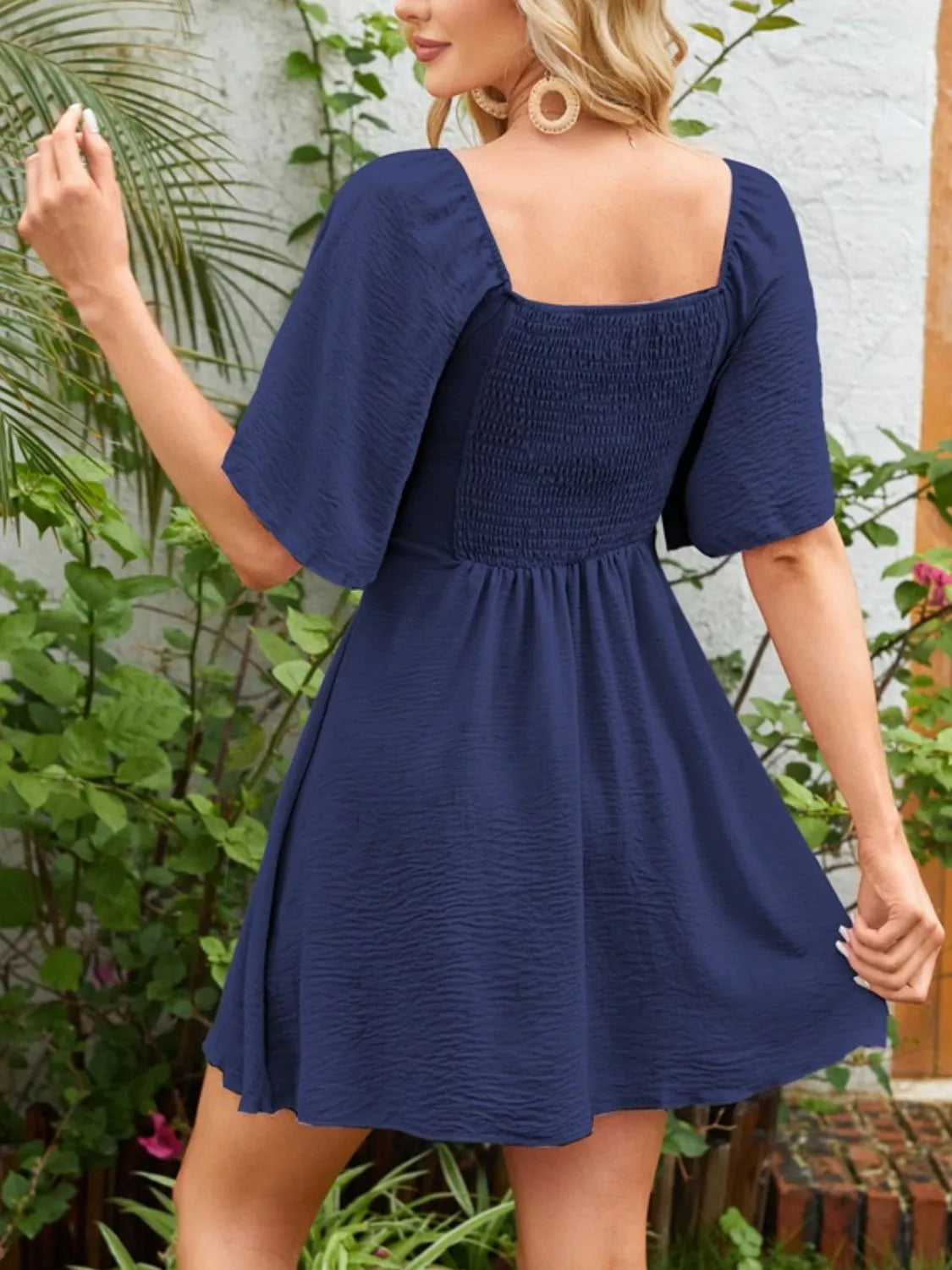 Flutter-sleeve tie dress