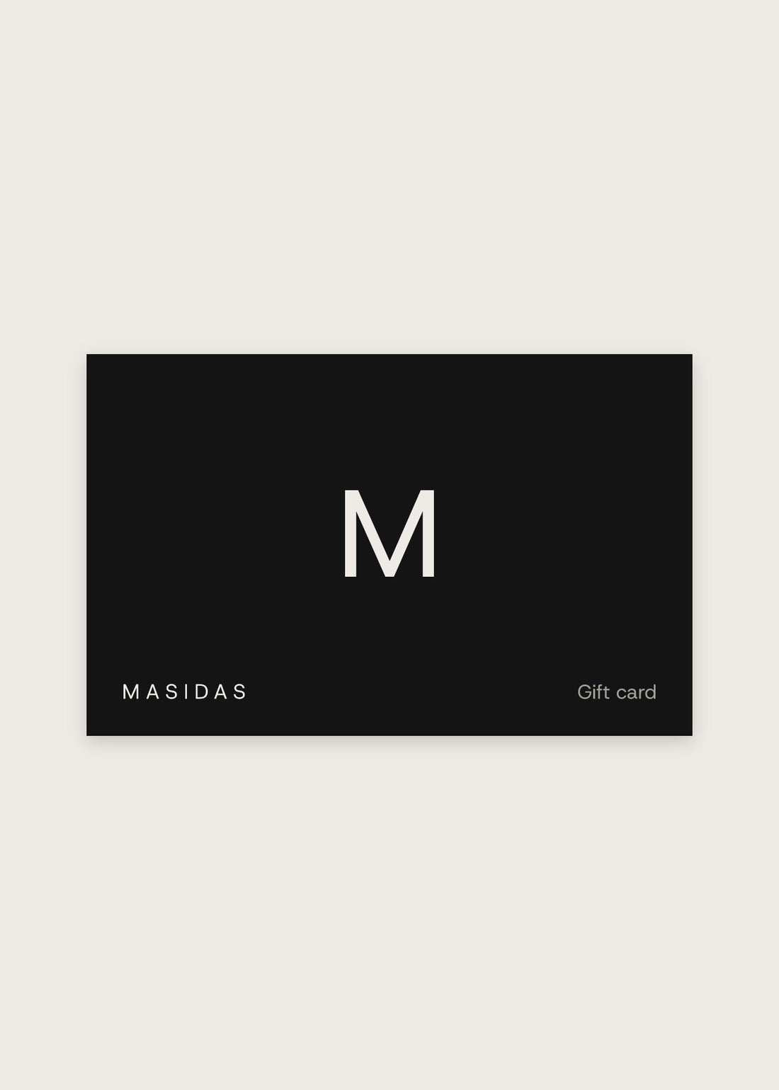 Masidas gift card: an ink card with the M mark on warm stone