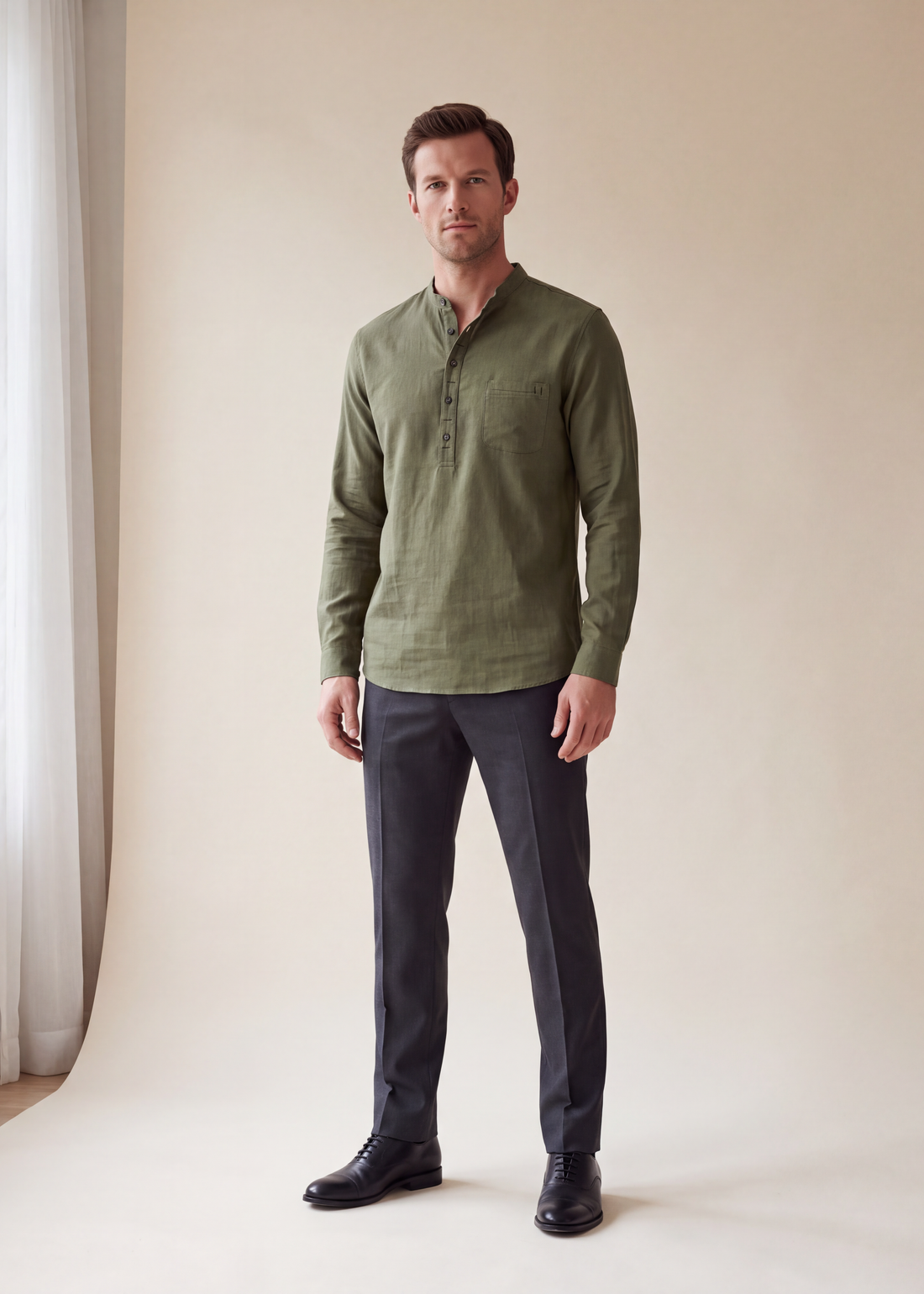 Linen cotton popover shirt, Moss, worn full length in the studio