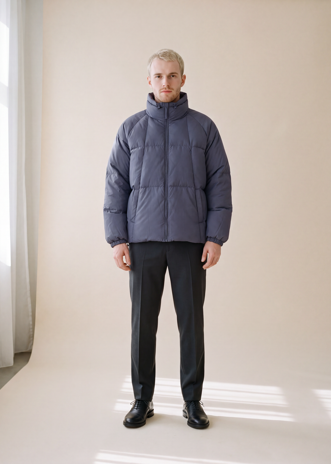 Quilted stand collar jacket, Indigo, worn full length in the studio