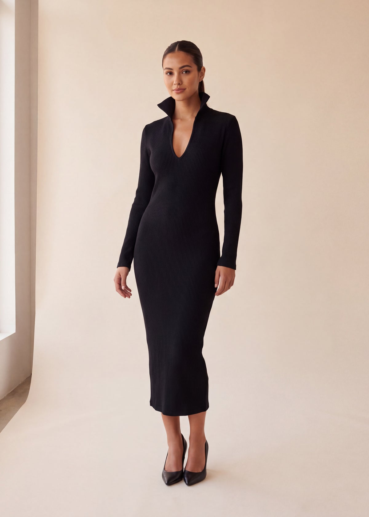 Ribbed V neck sweater dress, Black, worn full length in the studio